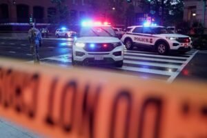 Bystander wounded in shooting near White House still undergoing treatment, has retained a lawyer