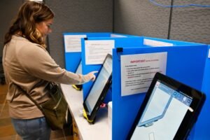 Georgia's vote-counting method will soon be banned. Lawmakers will try to find a fix this week