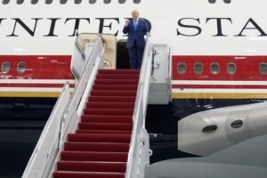 President Donald Trump unveils the new Air Force One, a converted Qatari jet