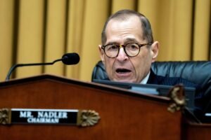 Ex-aides win primaries to replace retiring Democratic House members