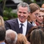 Newsom urges a national 'billionaires' tax' while fighting one in California