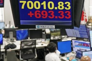 Bank of Japan raises its key interest rate to a three-decade high of 1%, citing inflation