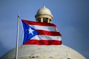 Puerto Rico roiled by widening political crisis as top official comes under fire