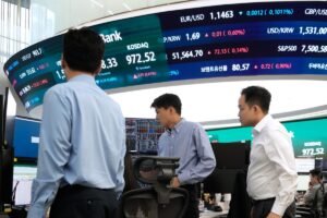 Asian shares are mixed and US futures fall as Iran talks make progress