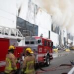 Boyle Heights fire expected to keep burning for days amid air quality warnings, schools relocating activities