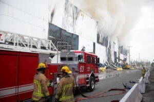 Boyle Heights fire expected to keep burning for days amid air quality warnings, schools relocating activities