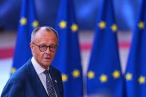 Germany's leader pledges to reform a creaking pension system and says 'failure is not an option'
