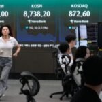 Asian shares plunge as traders sell to lock in profits after recent rallies driven by AI