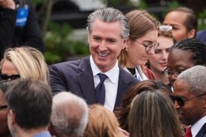 Newsom urges a national 'billionaires' tax' while fighting one in California