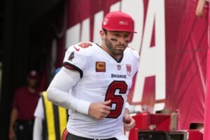 Baker Mayfield reporting to training camp without new contract: reports