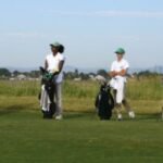 On an Aurora golf course, young caddies learn confidence, communication — and how to handle a paycheck