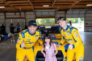 Connecticut kids living with serious illness or disability get to ride in race cars during a Team IMPACT day at Thompson Speedway