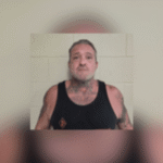 Man arrested in Cadillac Ranch assault accused of throwing explosive into victim's motorcycle shop days later