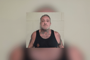 Man arrested in Cadillac Ranch assault accused of throwing explosive into victim's motorcycle shop days later