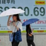 Asian shares are mostly higher and Mideast tensions push Brent crude past $96