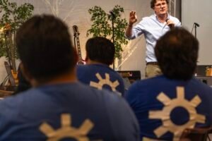 Day laborers come together at a convention to process a year and a half of ICE raids