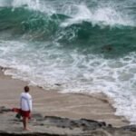 California lifeguards are rescuing thousands during high surf, heat waves this summer
