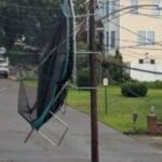 East Haven family's trampoline found tangled in power lines following storm